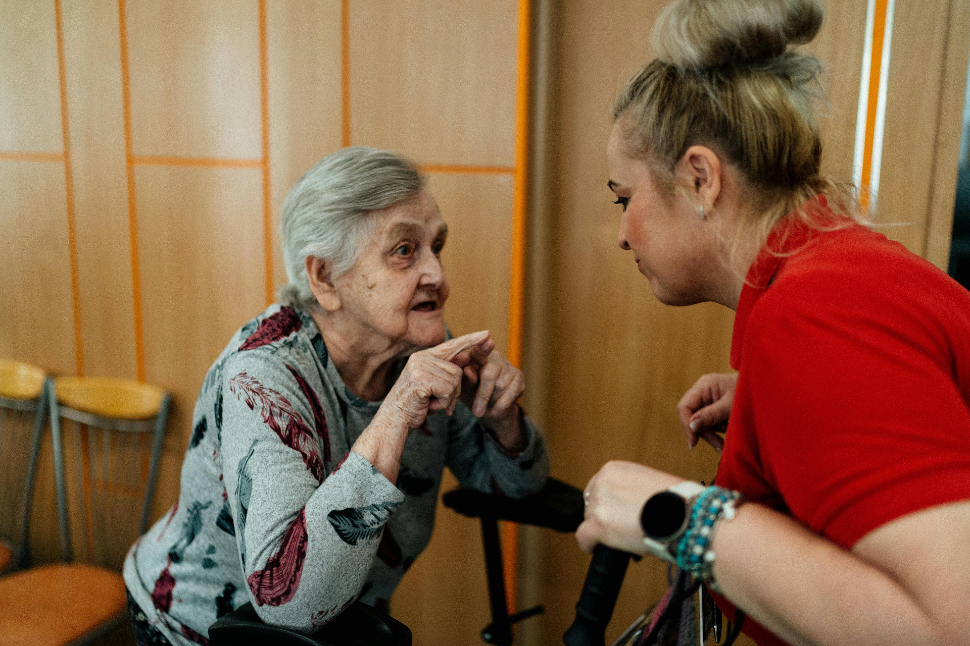 ASAH Care carer supporting an elderly client at home